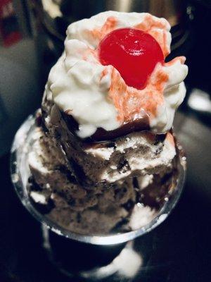 Medium hot fudge sundae w/ cookies and cream ice cream (favorite flavor since I was a kid)