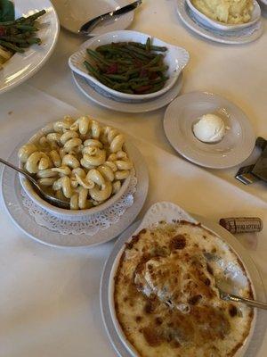 Artichoke Hearts Au Gratin at the bottom, macaroni and cheese, and haricot vert (the green beans)