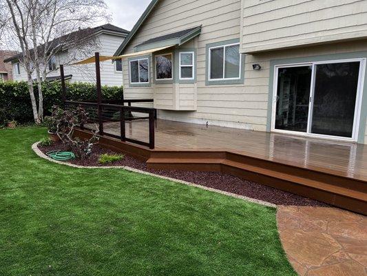 Trex deck with steel aircraft cable railing