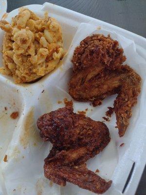 Mac and cheese, one bbq wing, one plain wing.