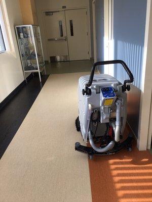 Commercial floor scrubber and vacuuming machine . We clean it all