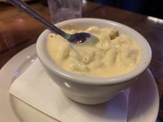 Side of Mac and cheese. Lumpy consistency and tasted like it was reheated