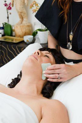 Sacred Fortune Facial Gua Sha sessions increase blood flow to the face and neck improving skin tone and glow.