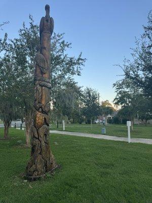 Wooden carvings made from a dead tree.