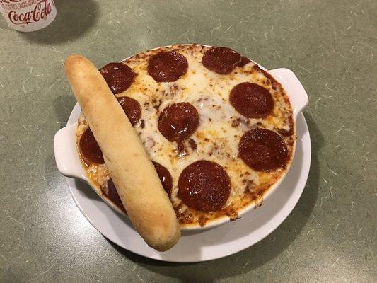 Baked spaghetti with pepperoni and garlic bread. Very delicious and fresh!