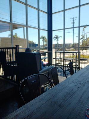 Nice corner seating area with high back leather chairs.