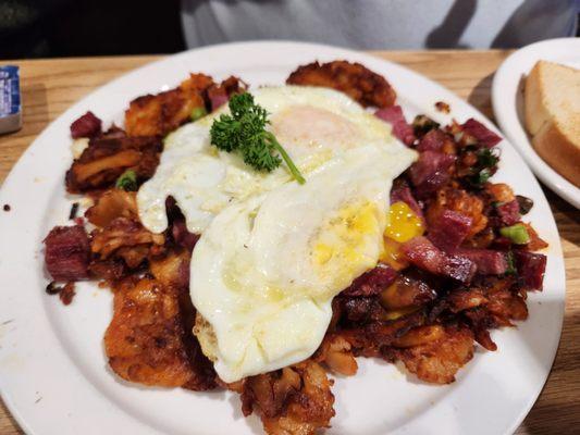 My brother's corned beef hash topped w/ an egg