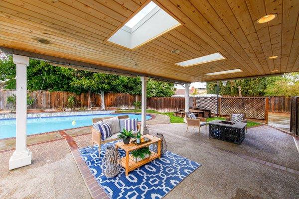 Pleasanton homes are known for fabulous backyards... enjoying summer fun poolside on the patio