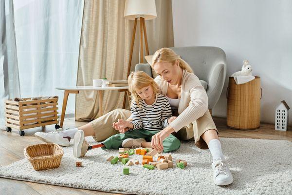 Mother and daughter playing on clean carpets in Benbrook