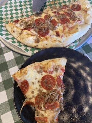 Pepperoni and Italian sausage pizza