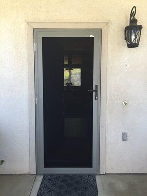 Security swinging screen door