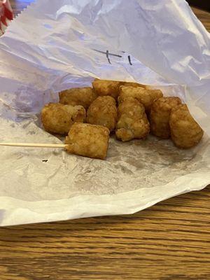 Tater tots (severely undercooked)