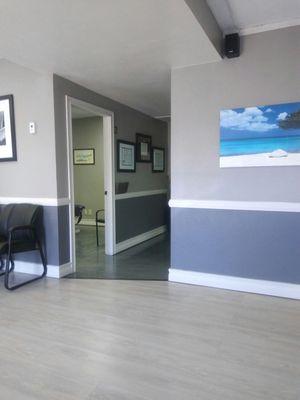 Taken from the wairing area. The room on the ledt is a private consultation room. Behind the wall is the physical therapy area.