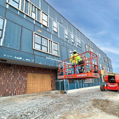 Preparing to install some exterior grills on the John Arthur Flats project.