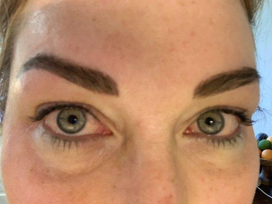 Permanent eyeliner. Red eyes, just completed.