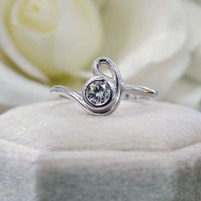 Custom bezel set diamond ring