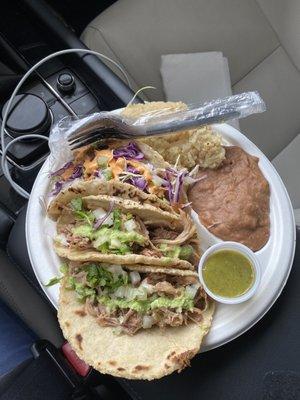 Carnitas and Marlin tacos with rice/beans