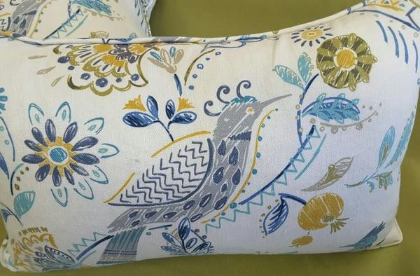 We have custom made feather/down pillows, fabric, and upcycled furniture. Services also include upholstery and custom drapes.