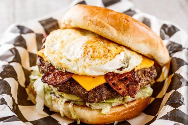 Sunrise Burger with Fried egg, cheese, and bacon