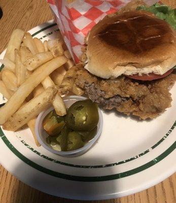 Not on the menu chicken fried steak sandwich, fries cup of yellow chicken gravy and jalapeños to add to the sandwich