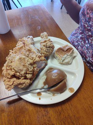 Chicken breast, mashed potatoes, and roll