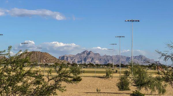 View of the Superstitions from parking lot overlooking the first few disc golf buckets