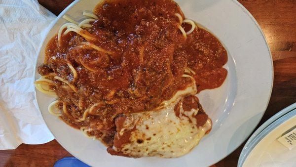 Chicken parmesan with spaghetti with meat sauce