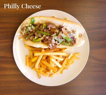 Philly Cheese sandwich with onions and peppers. Side of French fries