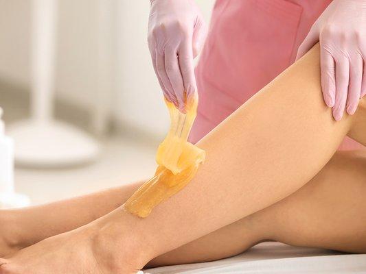 Sugaring paste on leg