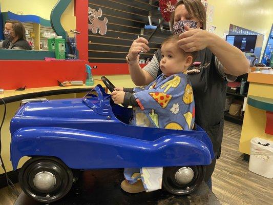 He loved sitting in the car and watching cartoons.