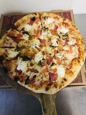 Mama Maria Pizza with prosciutto, ricotta, fresh tomatoes...