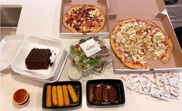 Pizza, salad, mozzarella sticks, eggplant rolotini, and chocolate cake. A feast fit for kings!