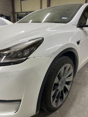 Tesla Model Y fender damage repair