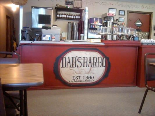 Counter of Dad's Bar-B-Q, view from table by front door.