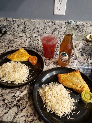 Chicken and pork empanadas with basmati rice and drinks