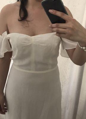 Top still doesn't fit after picking up my dress a week later.