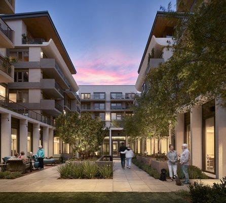 Sunset in the courtyard at Fountainview at Gonda