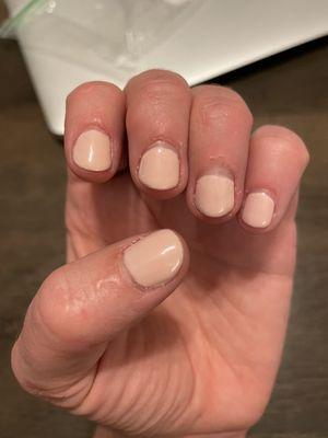 My rushed gel manicure, cuticles weren't cut and the nails aren't even filed evenly