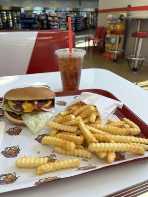 Bacon cheeseburger and fries combo.