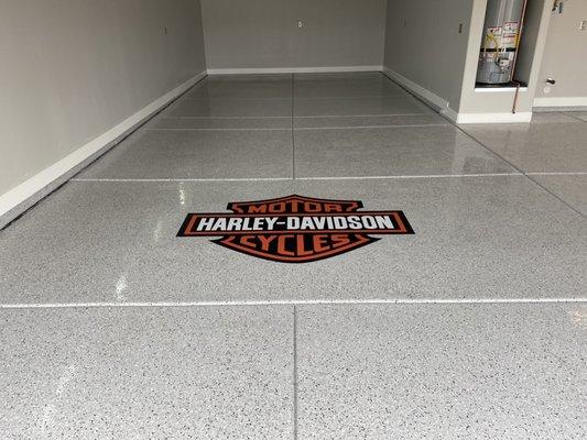 Epoxy garage floor with logo