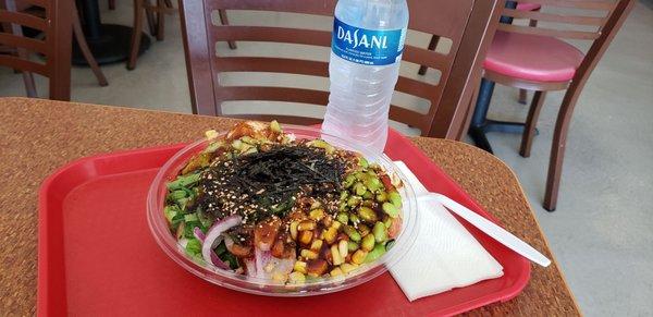 Salmon bowl regular $14.99 water $1.75