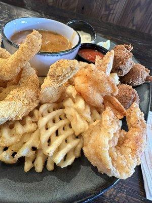 Louisiana Platter -- these shrimp were HUGE...hushpuppies were delicious...loved the catfish strips!