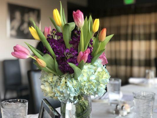 Tulips, roses, and hydrangeas.