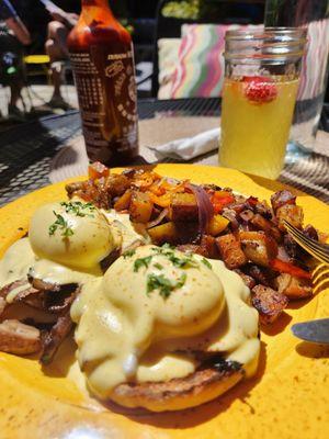 Eggs Benedict with vegetable hash and mango peach mimosa