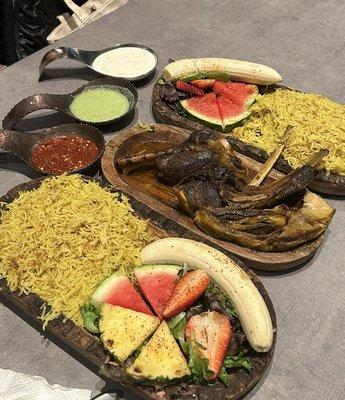 Lamb shank, goat shoulder, rice and fruit