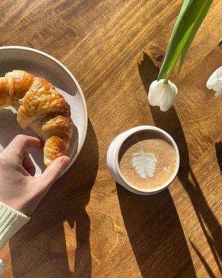 Coffee with organic A2 milk and baked goods from Noble Bakery