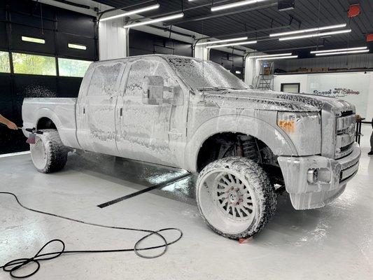 This customers truck is in the process of getting detailed and is in the wash phase.