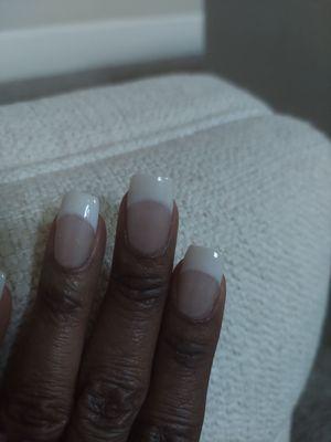 Supposed to be a SNS Amer. manicure.  It's a NIGHTMARE! Mgr. offered to redo them tomorrow....NO THANK YOU. Won't be back.