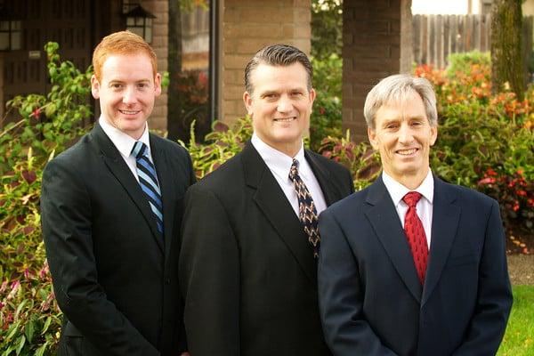 Dr. Robert Adams (R), Dr. Laurence Adams (M), Dr. Grant Dobson (L)