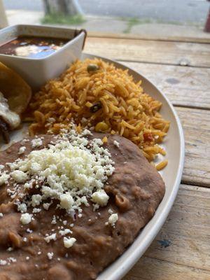 Rice & Beans $2 Your choice of black or refried beans and rice.